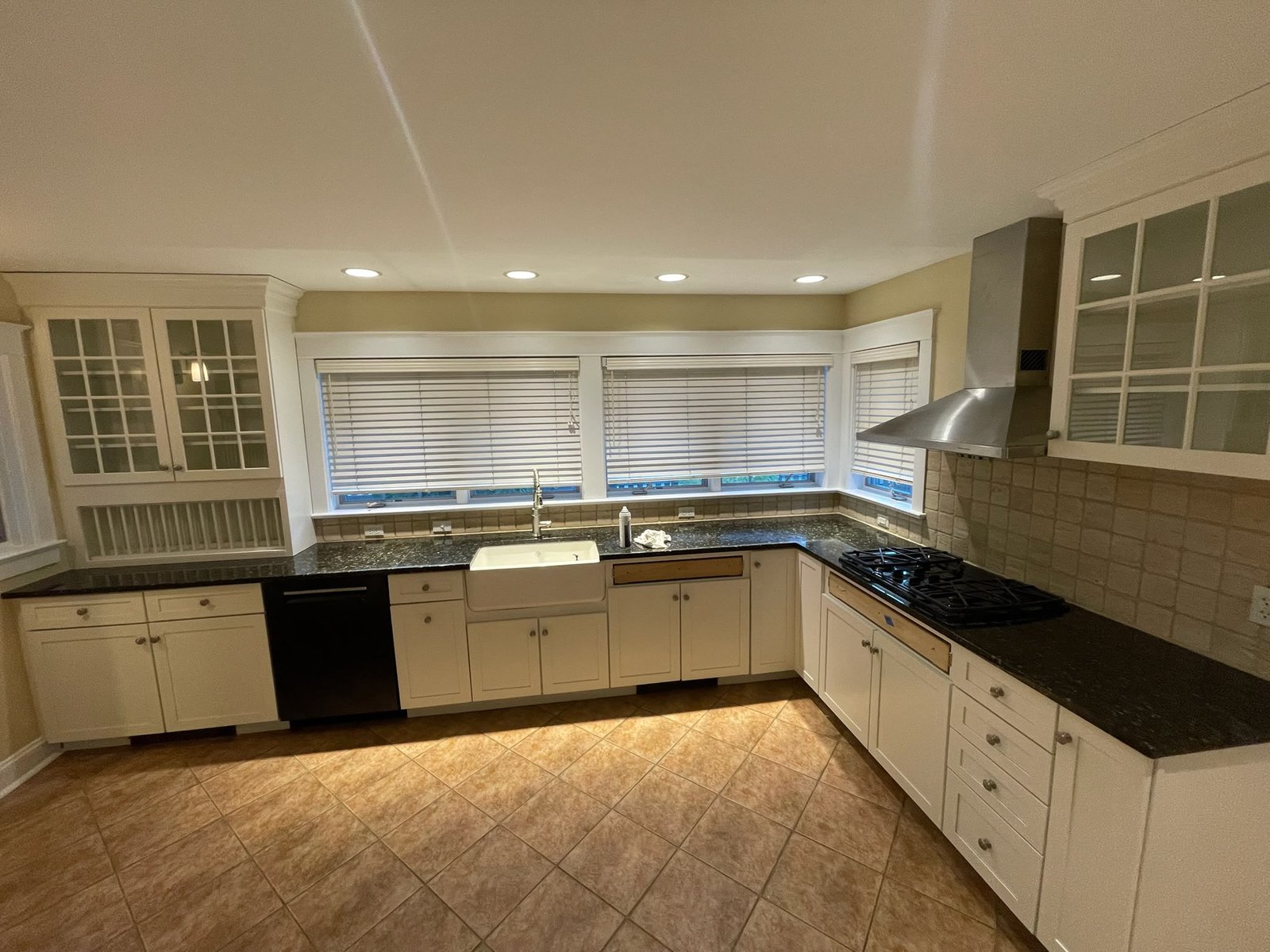 Same kitchen finished in crisp white with a smooth, showroom-quality coat